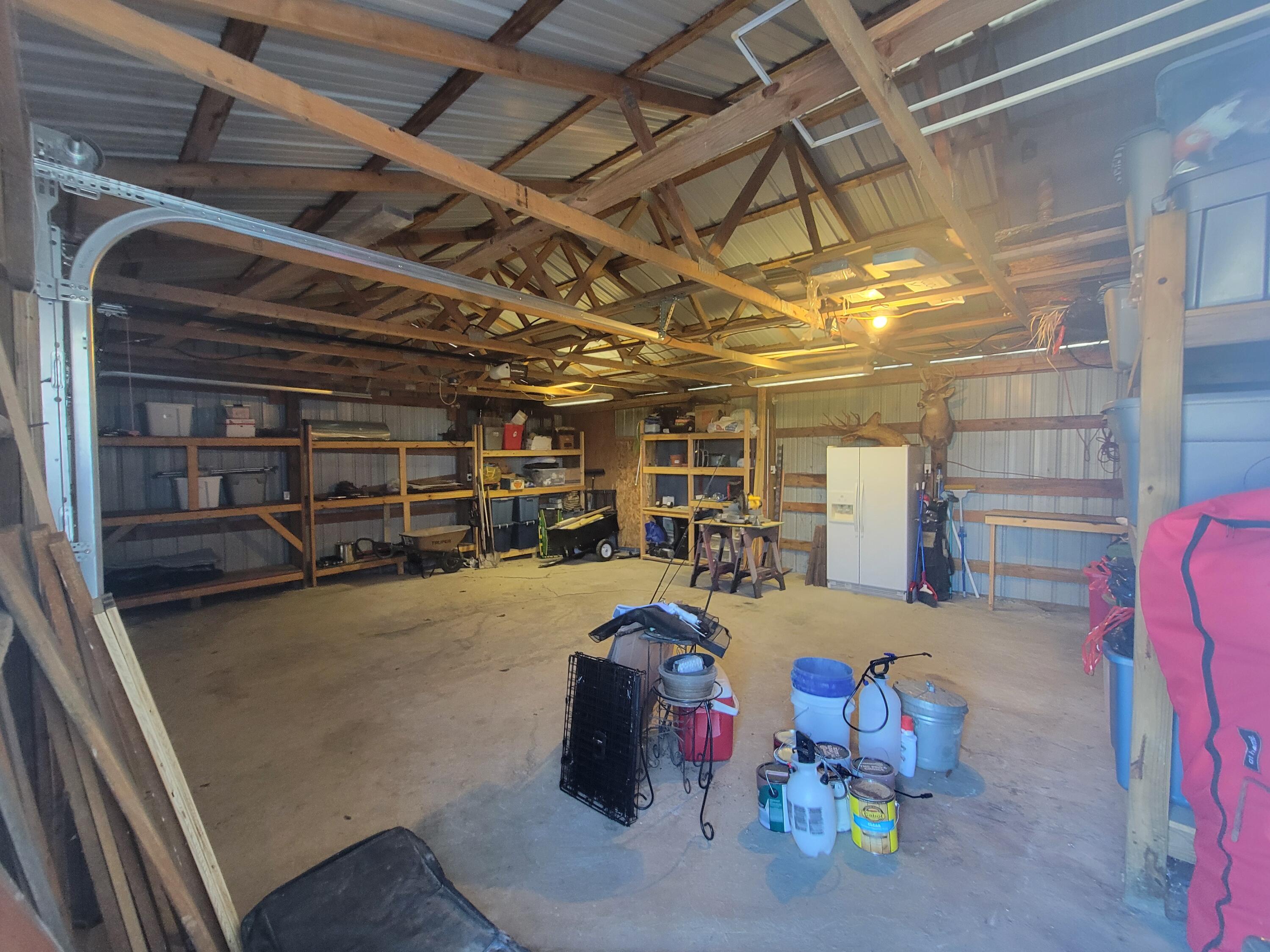 278 Luke Road Sadieville, KY 40370 - Photo 24 of 47 Interior of detached garage/workshop - built in shelving, refrigerator stays.