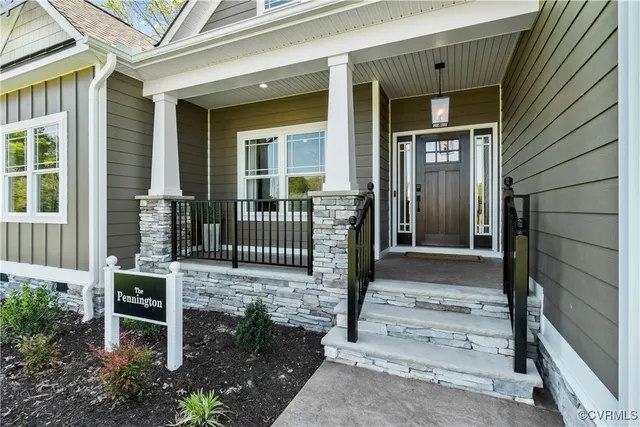 a front view of a house with a porch