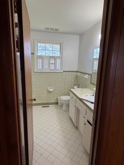 3509 Pinson School Road Springfield, TN 37172 - Photo 16 of 16 a bathroom with a granite countertop sink a mirror and a bathtub
