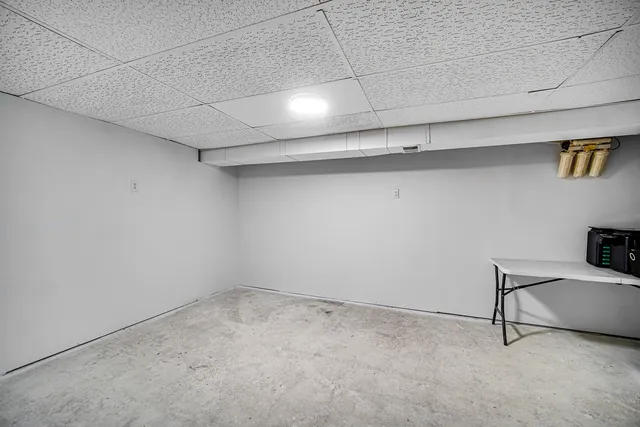 a view of a room with racks on the wall