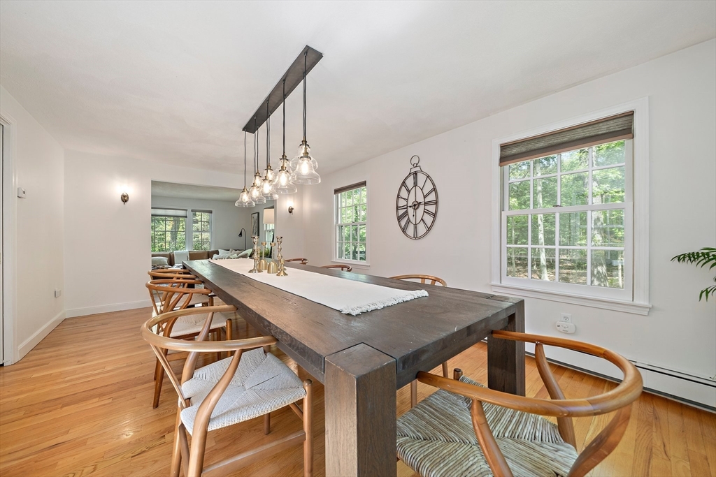 6 Garfield Street Lexington, MA 02421 - Photo 11 of 40 a view of a dining room with furniture and window