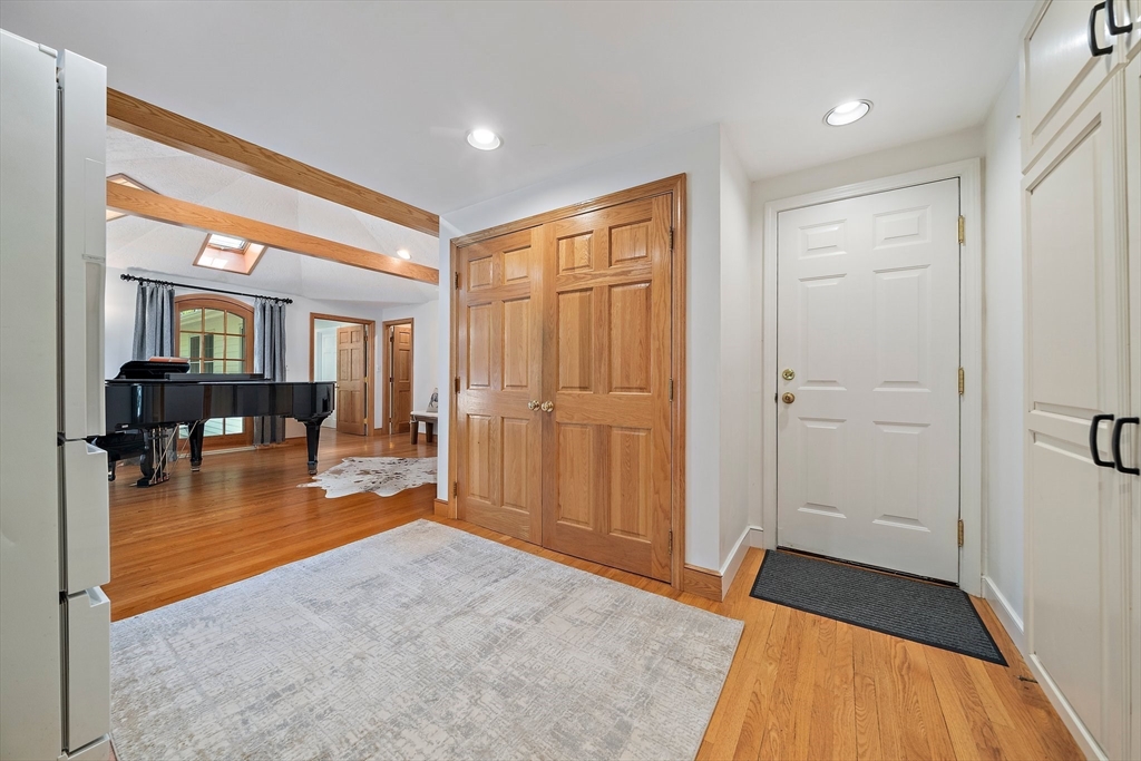 6 Garfield Street Lexington, MA 02421 - Photo 17 of 40 a view of a livingroom with wooden floor and furniture