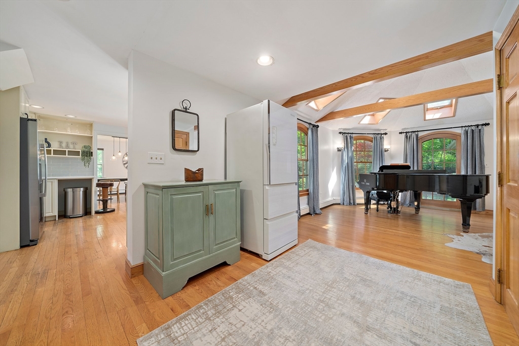 6 Garfield Street Lexington, MA 02421 - Photo 18 of 40 a living room with furniture and a large window