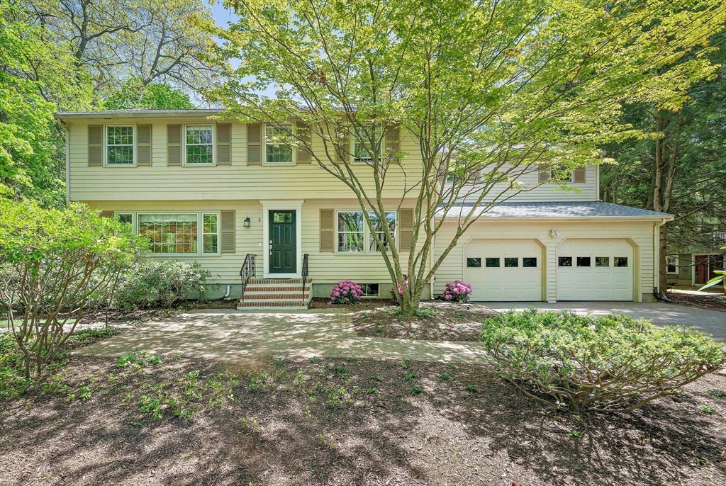 6 Garfield Street Lexington, MA 02421 - Photo 2 of 40 a front view of a house with a yard