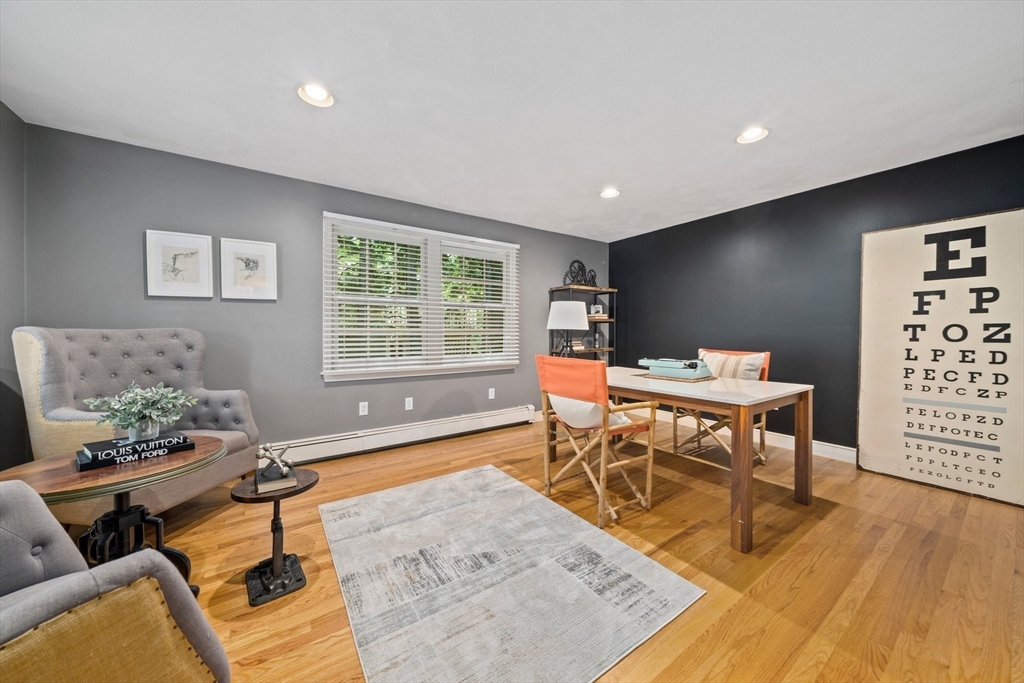 6 Garfield Street Lexington, MA 02421 - Photo 23 of 40 a living room with furniture a window and a flat screen tv