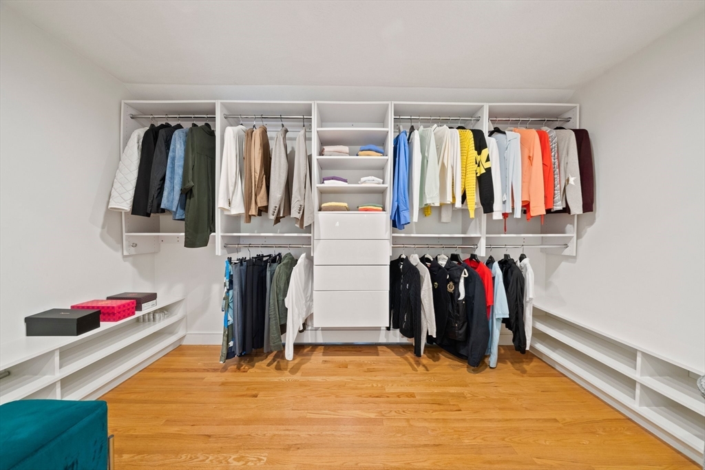 6 Garfield Street Lexington, MA 02421 - Photo 29 of 40 a view of walk in closet with clothes and shoes