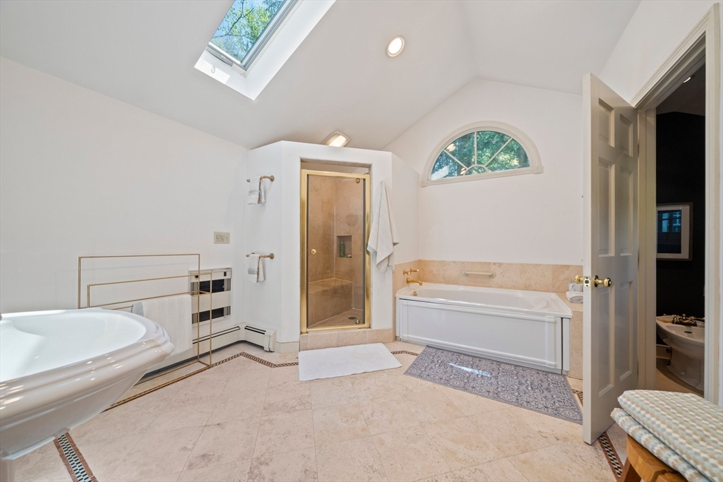 6 Garfield Street Lexington, MA 02421 - Photo 30 of 40 a bathroom with a tub toilet and a shower