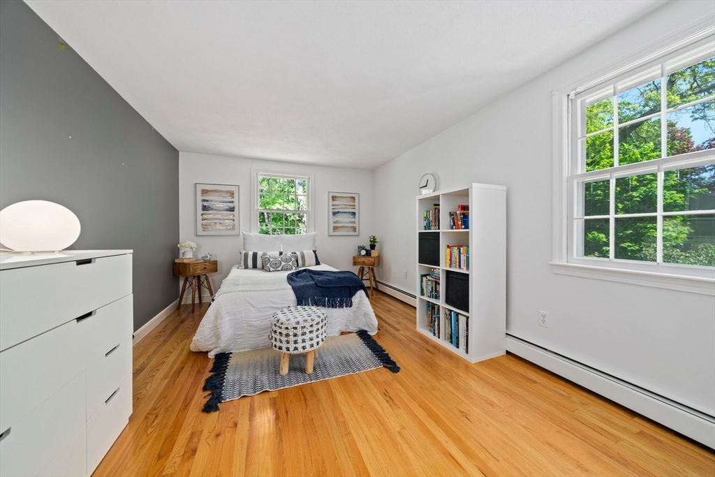 6 Garfield Street Lexington, MA 02421 - Photo 32 of 40 a living room with furniture and a window