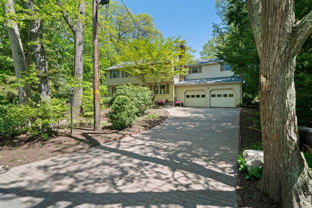 6 Garfield Street Lexington, MA 02421 - Photo 4 of 40 a view of a back yard of the house