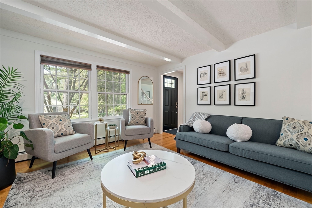 6 Garfield Street Lexington, MA 02421 - Photo 5 of 40 a living room with furniture and a large window