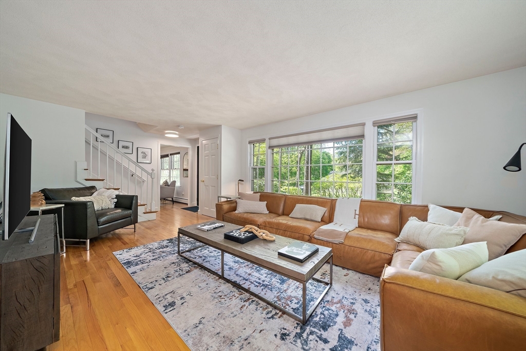6 Garfield Street Lexington, MA 02421 - Photo 8 of 40 a living room with furniture and a window