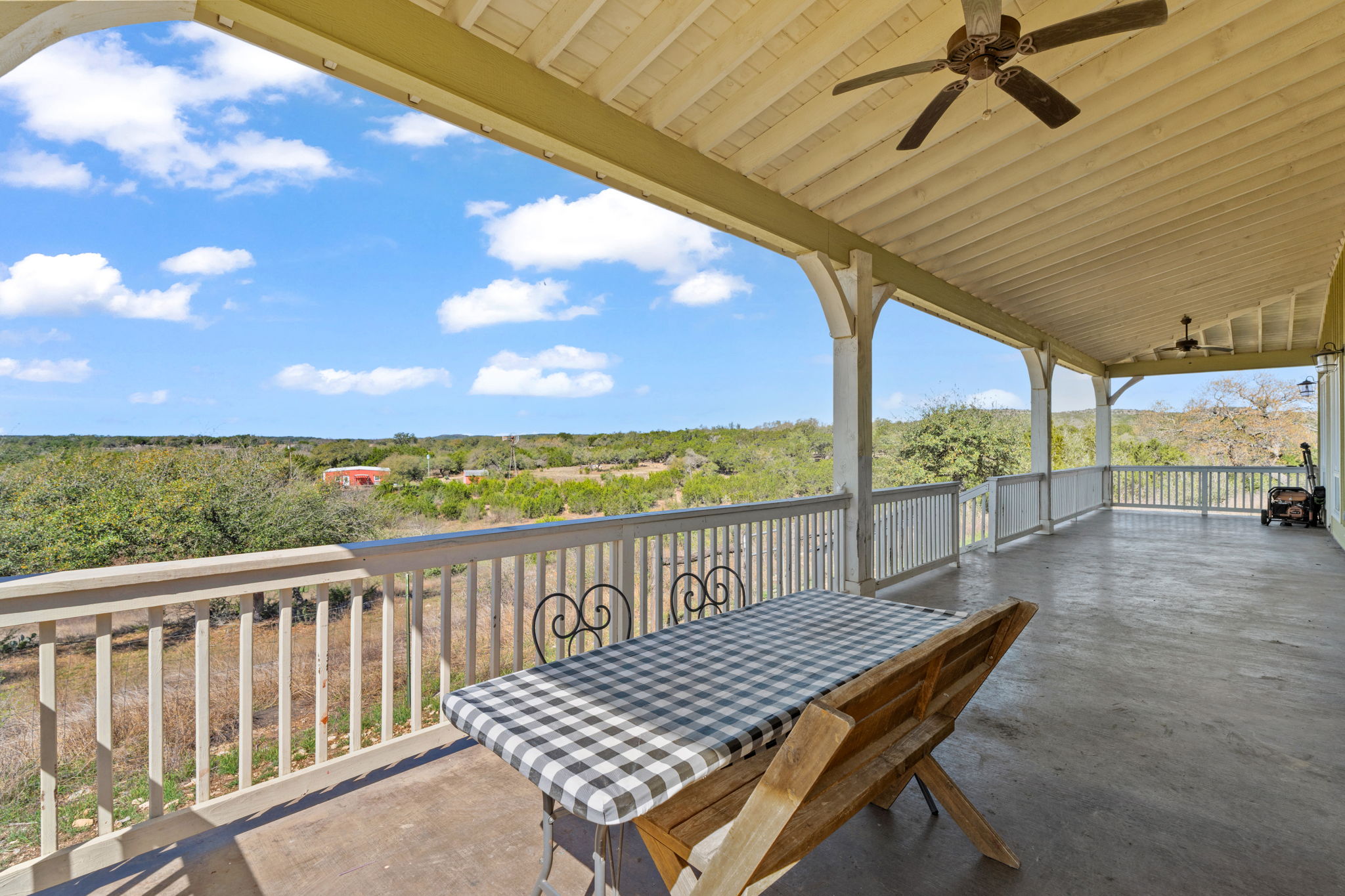 6350 Mt Sharp Road, Unit B Wimberley, TX 78676 - Photo 10 of 34 a view of a balcony with chairs