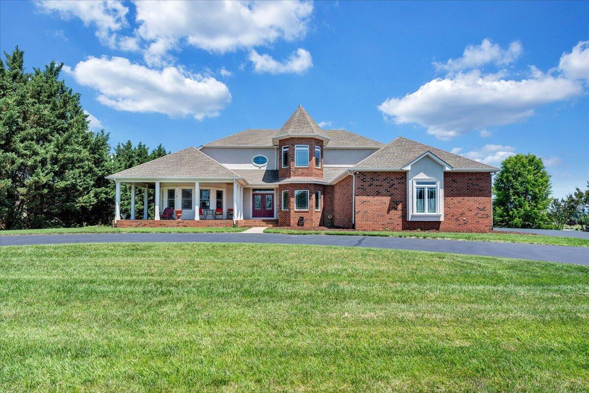 625 Frontier Way Fincastle, VA 24090 - Photo 77 of 105 a front view of a house with garden