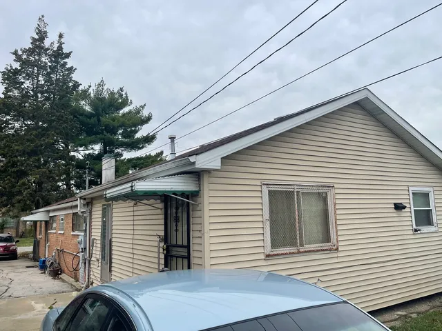 a front view of a house with a garage