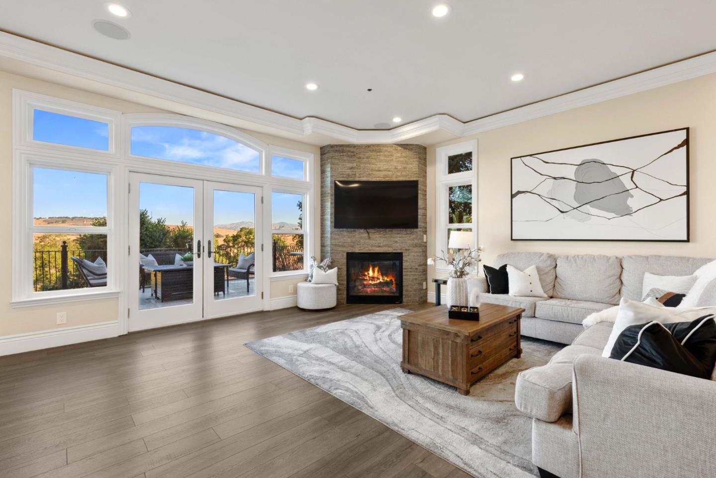 20394 Almaden Road San Jose, CA 95120 - Photo 11 of 92 a living room with furniture a fireplace and a flat screen tv