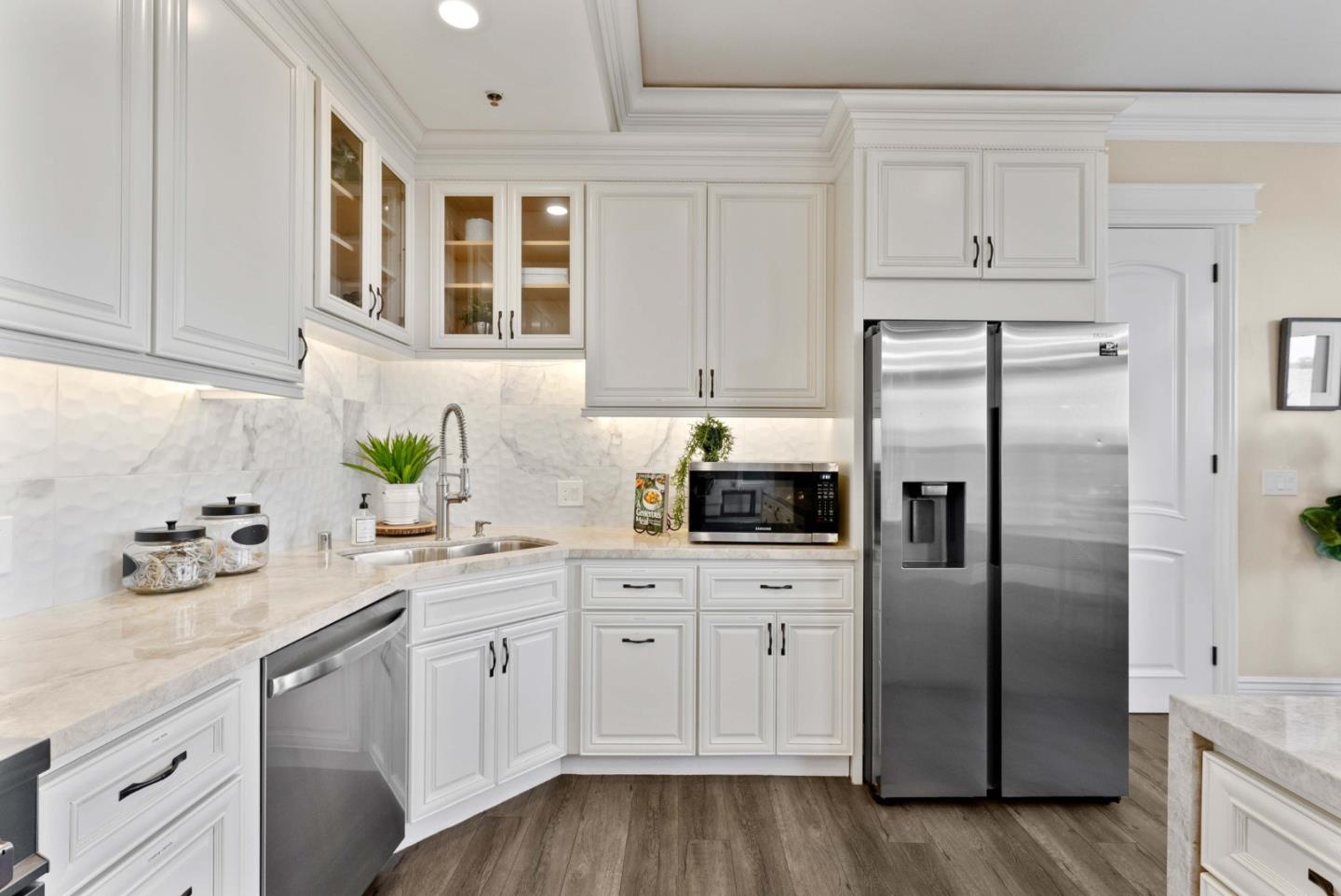 20394 Almaden Road San Jose, CA 95120 - Photo 15 of 92 a kitchen with a refrigerator sink and cabinets