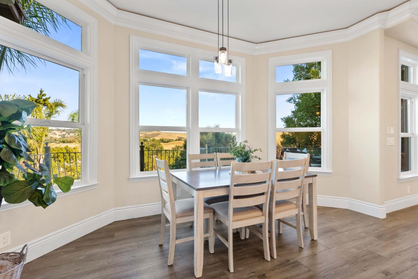20394 Almaden Road San Jose, CA 95120 - Photo 19 of 92 a view of a dining room with furniture a chandelier and wooden floor