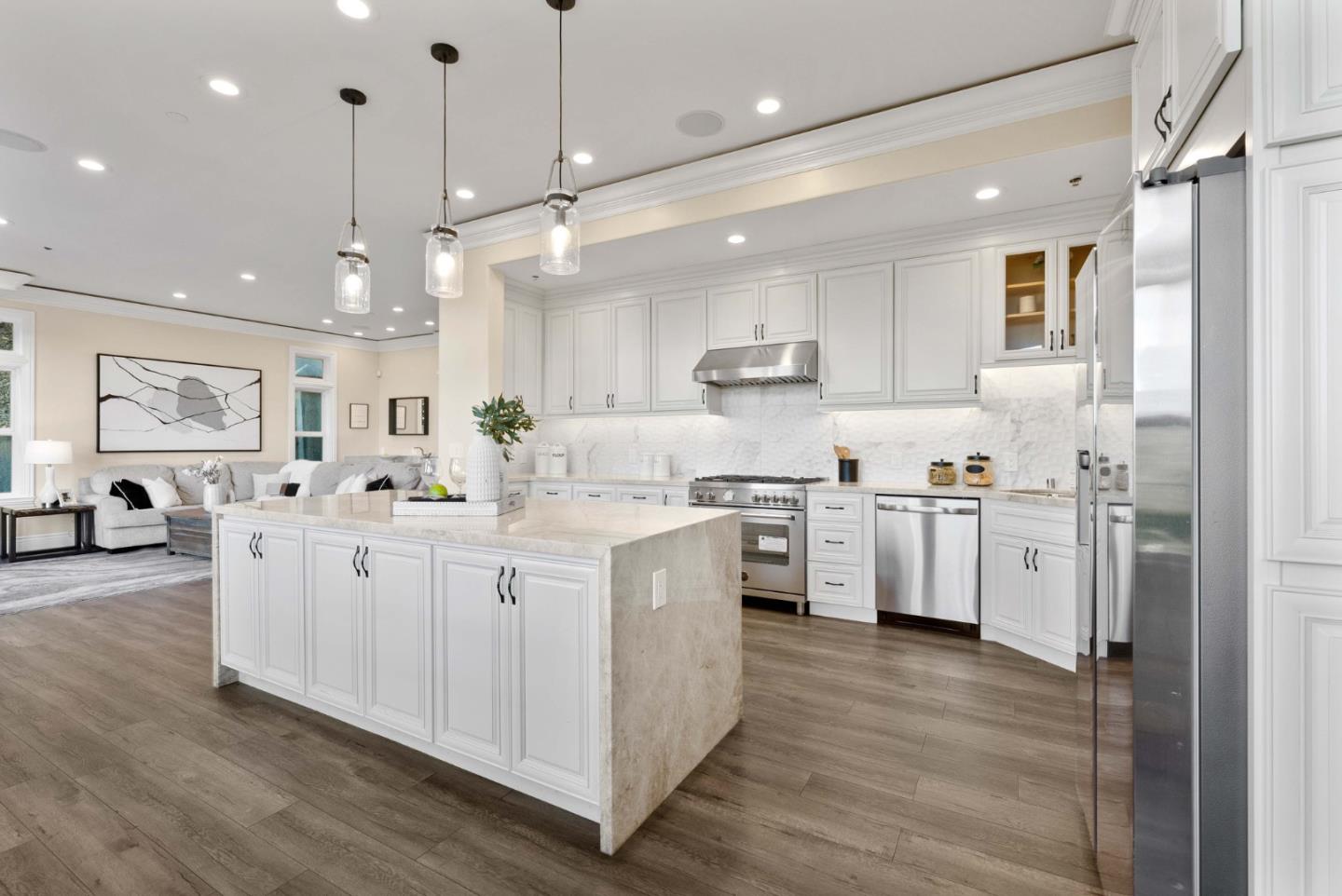 20394 Almaden Road San Jose, CA 95120 - Photo 20 of 92 a kitchen with white cabinets and white appliances