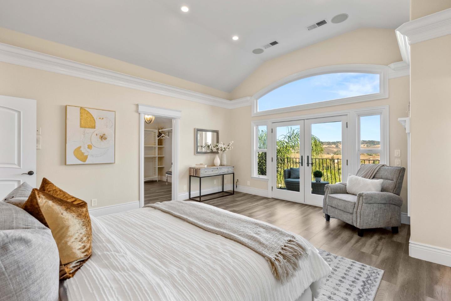 20394 Almaden Road San Jose, CA 95120 - Photo 25 of 92 a spacious bedroom with a large bed and a couch