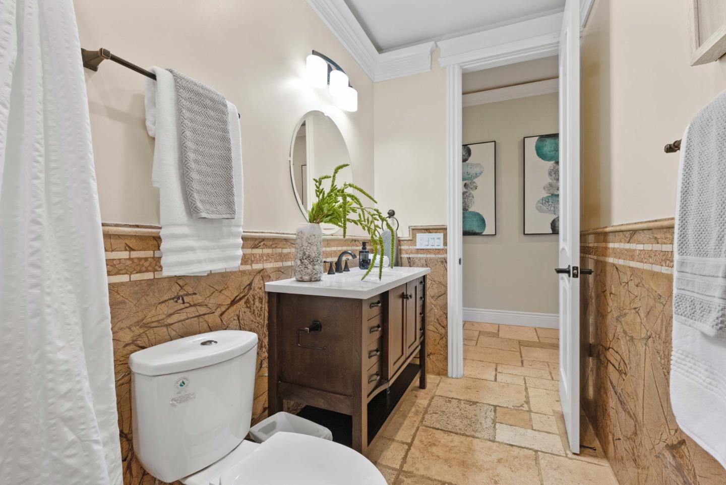 20394 Almaden Road San Jose, CA 95120 - Photo 41 of 92 a bathroom with a toilet sink and mirror