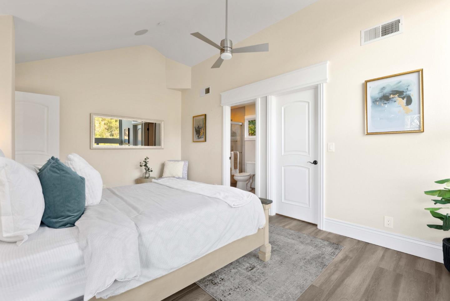 20394 Almaden Road San Jose, CA 95120 - Photo 52 of 92 a spacious bedroom with a bed and a cabinets