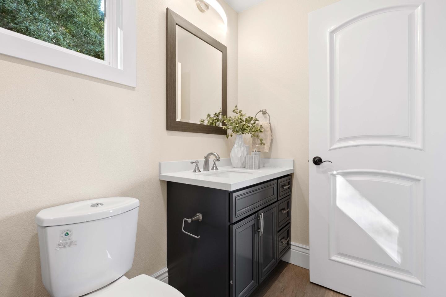 20394 Almaden Road San Jose, CA 95120 - Photo 55 of 92 a bathroom with a toilet sink and mirror