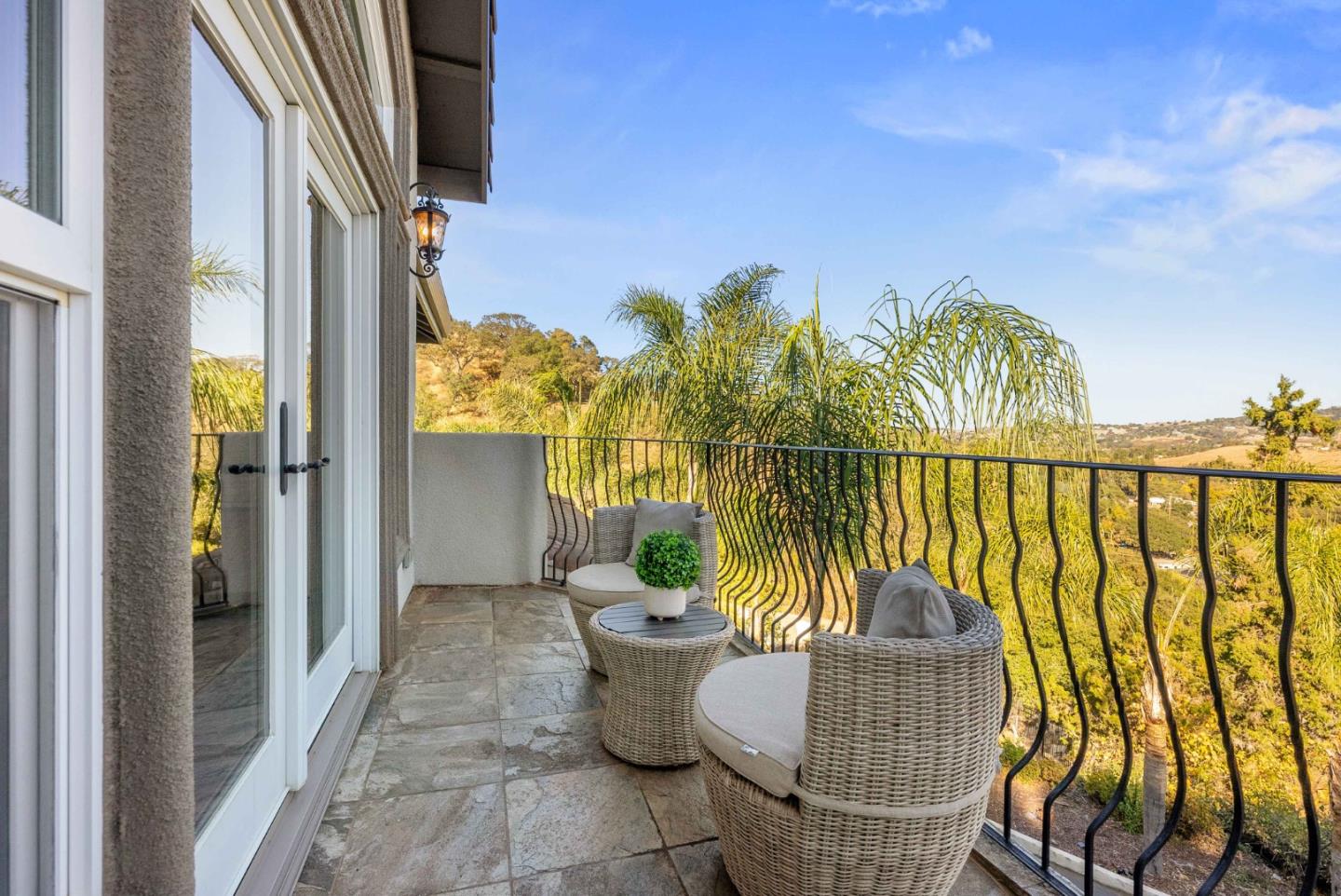 20394 Almaden Road San Jose, CA 95120 - Photo 62 of 92 a view of a balcony with chair and table in the balcony