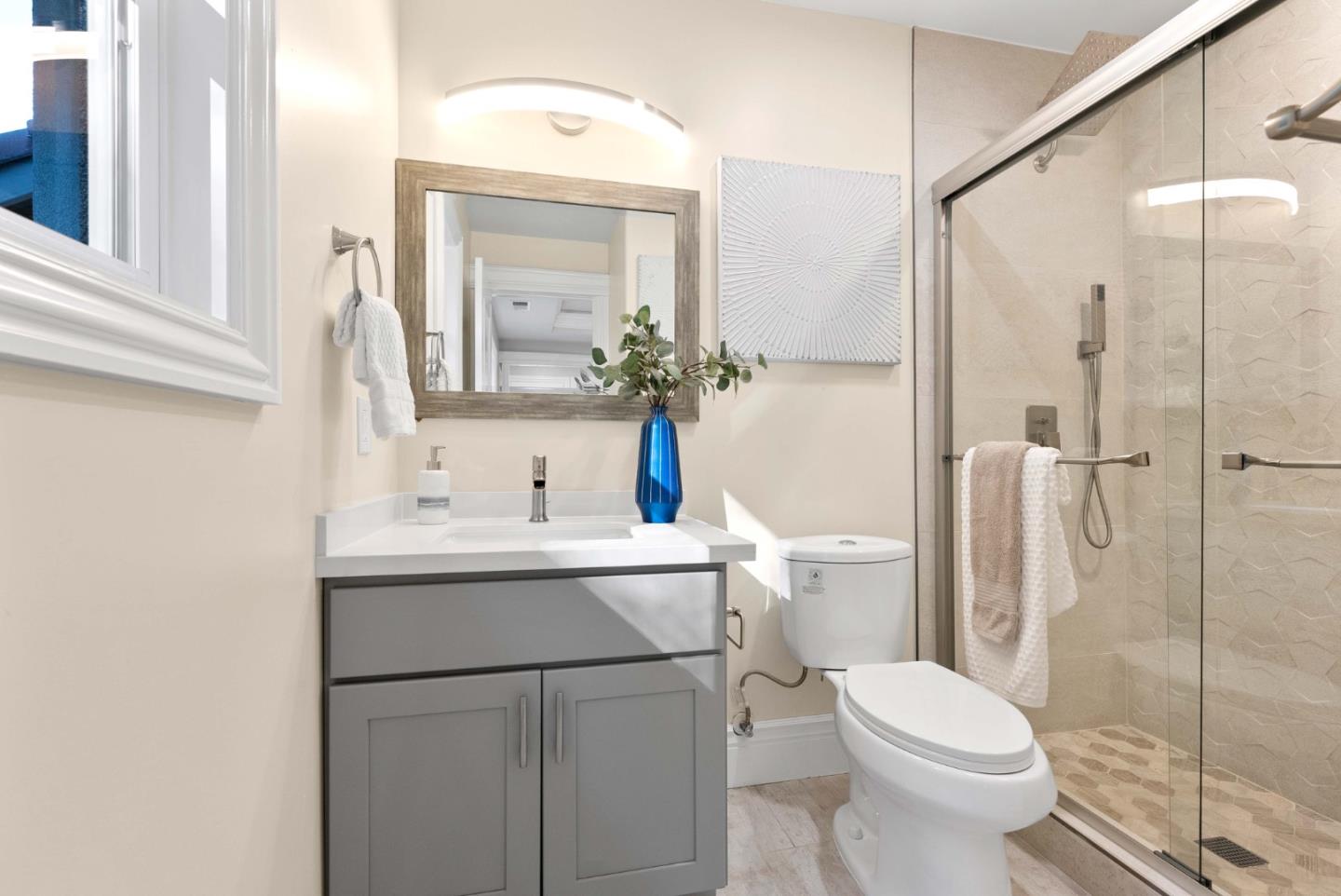 20394 Almaden Road San Jose, CA 95120 - Photo 69 of 92 a bathroom with a sink toilet and shower