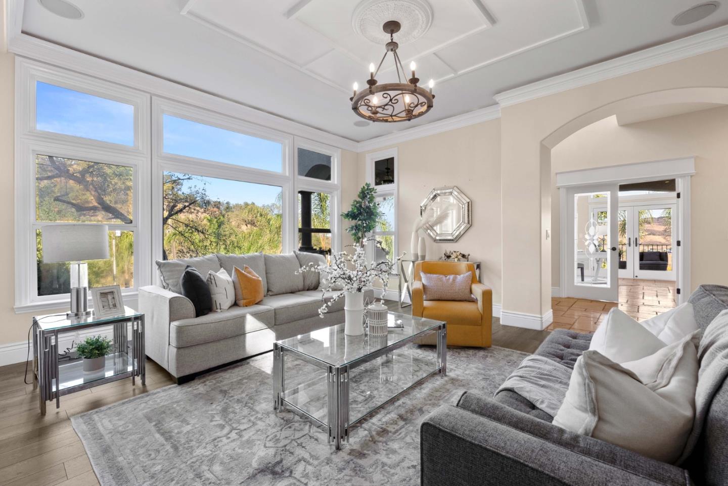 20394 Almaden Road San Jose, CA 95120 - Photo 8 of 92 a living room with furniture chandelier and a large window