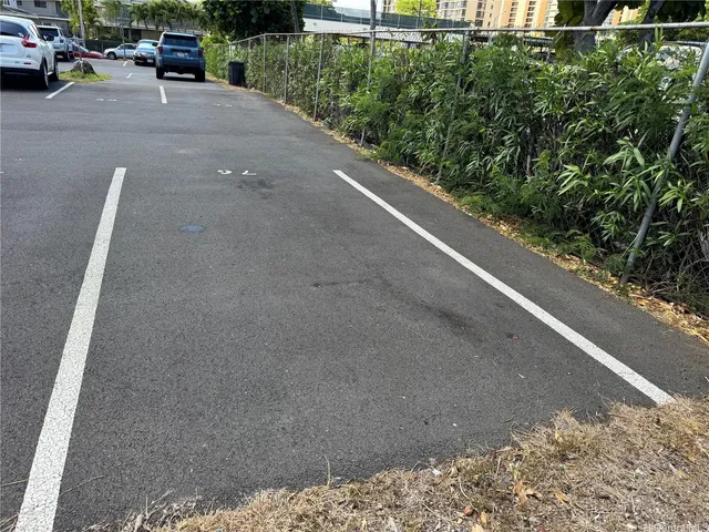 a view of a street with cars