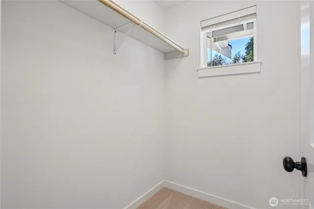 a view of small space with racks on the wall