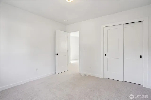 a view of a sink and a window in a bathroom