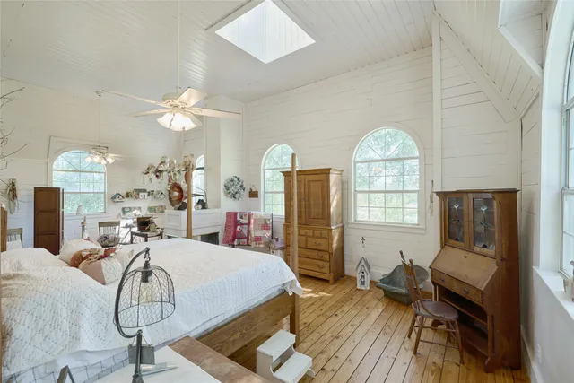 a room with gym equipment and windows