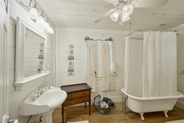 a bed room with a bed and furniture