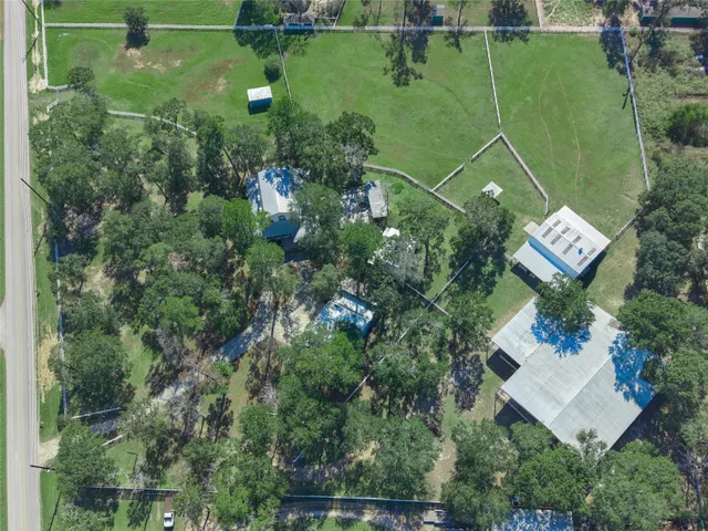 a view of empty room with wooden ceiling