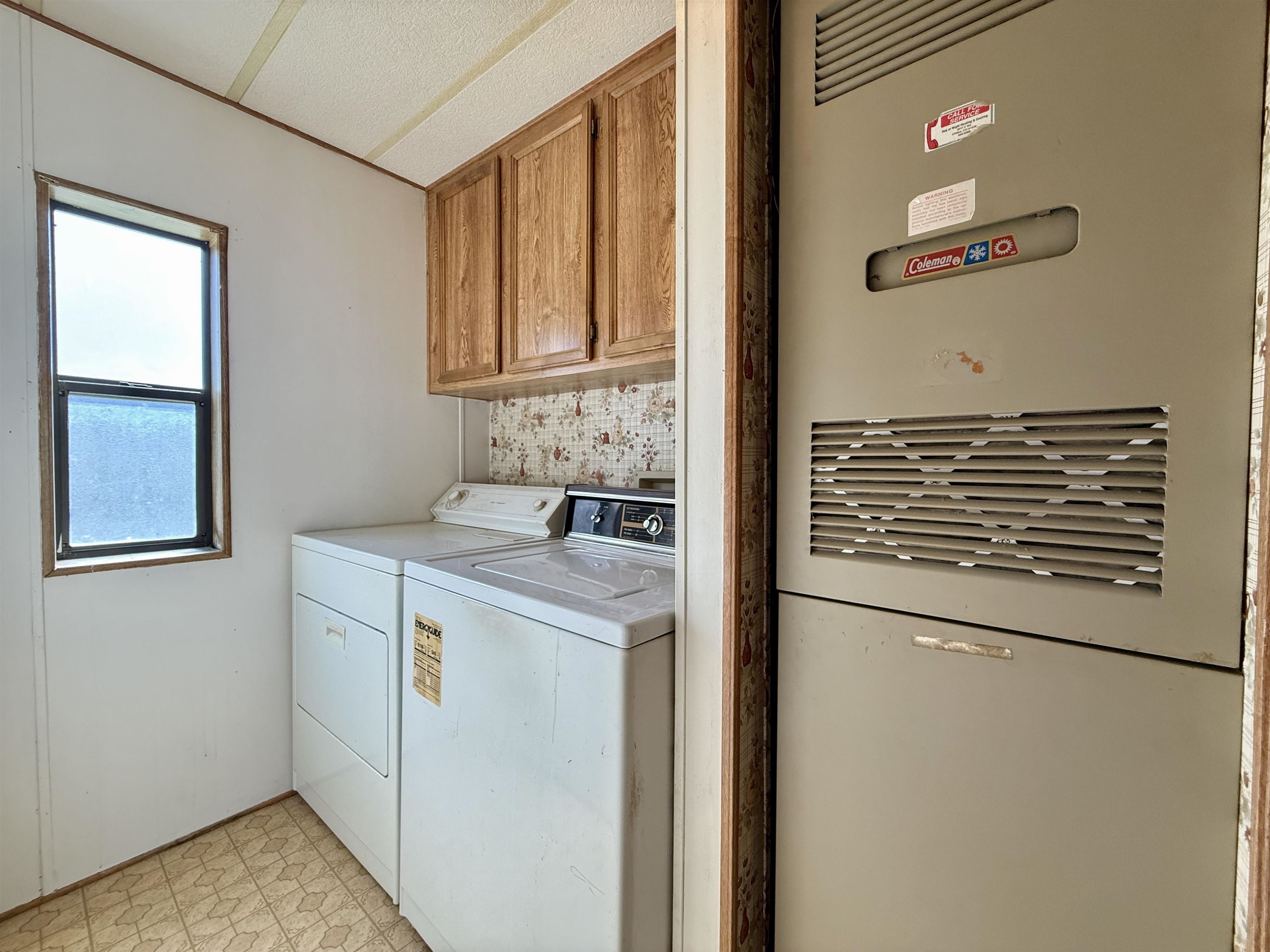 3251 E Road, Unit 33 Clifton, CO 81520 - Photo 16 of 28 a utility room with closet dryer and washer
