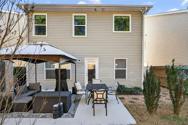 a view of a house with patio