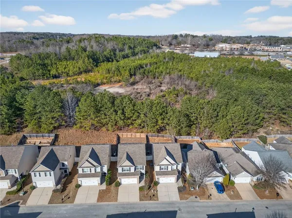 an aerial view of a house having yard