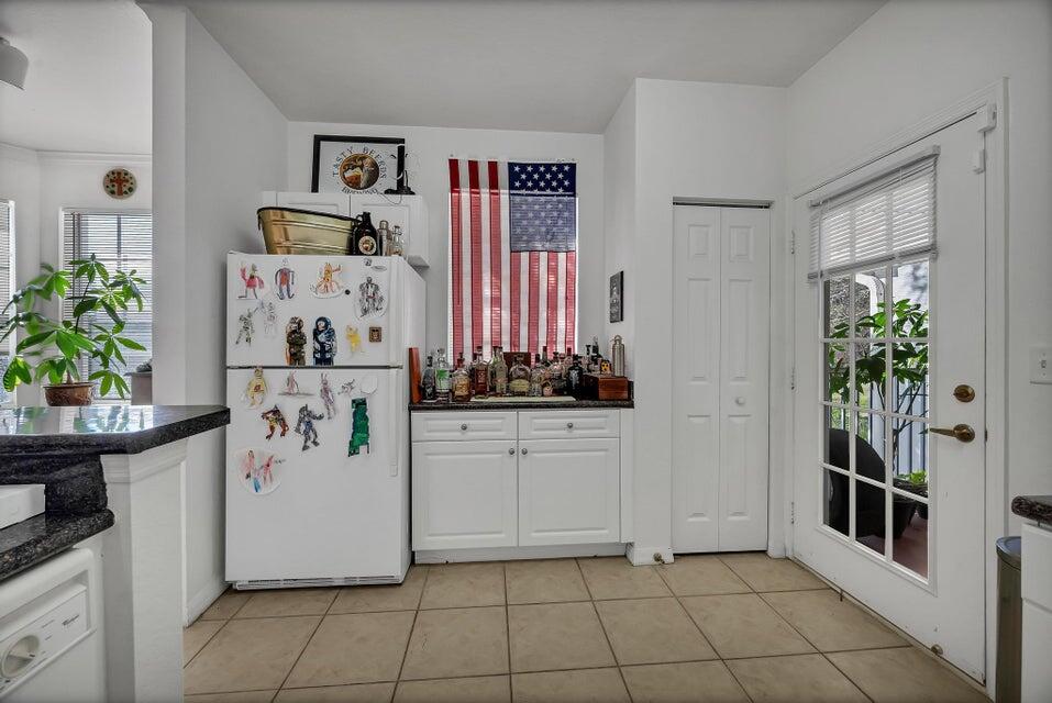 360 Southeast Rogers Court Stuart, FL 34994 - Photo 15 of 25 a view of kitchen with refrigerator and window