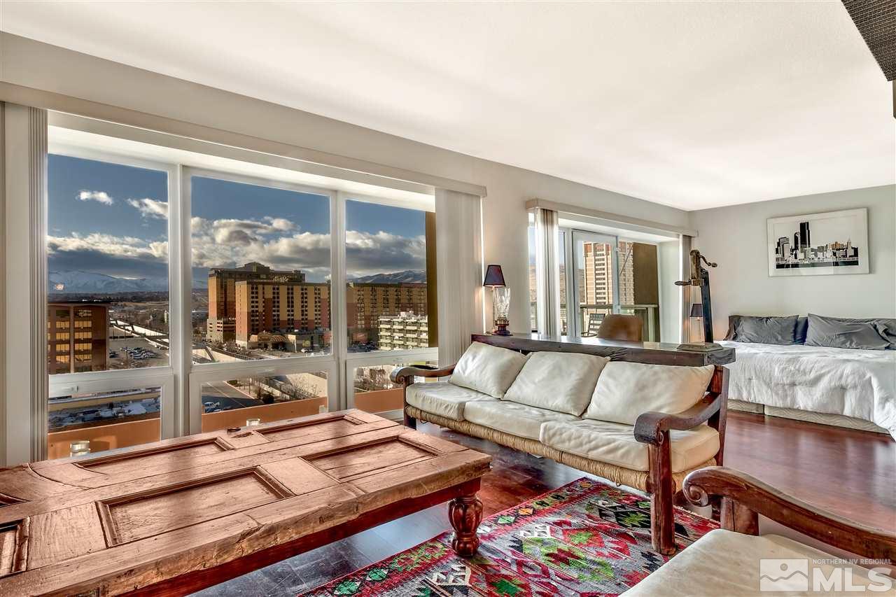 255 North Sierra Street Reno, NV 89501 - Photo 2 of 17 a living room with furniture and a large window