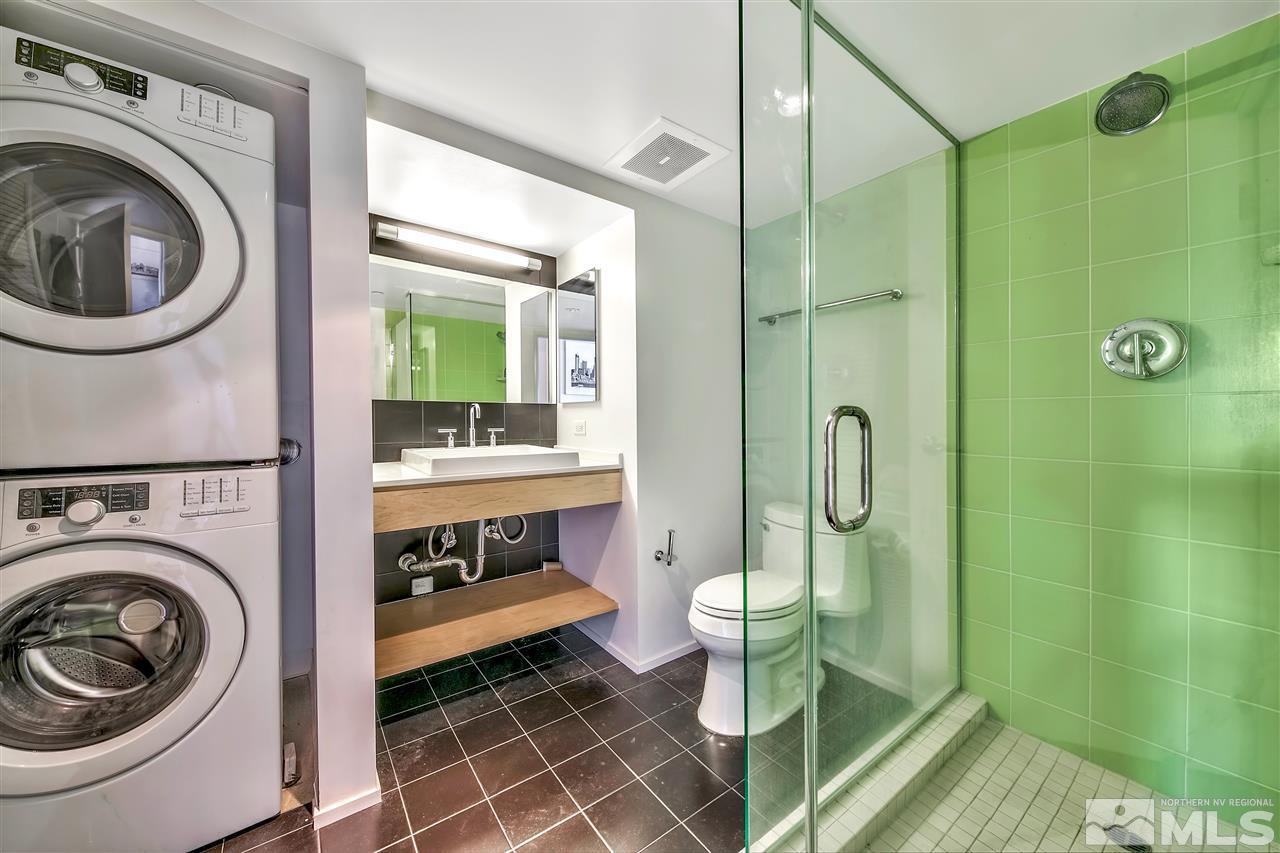 255 North Sierra Street Reno, NV 89501 - Photo 9 of 17 a bathroom with a toilet a sink and a shower