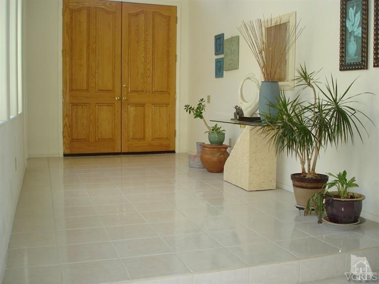 4220 Kingsview Road Moorpark, CA 93021 - Photo 4 of 54 a potted plant sitting in front of a bathroom