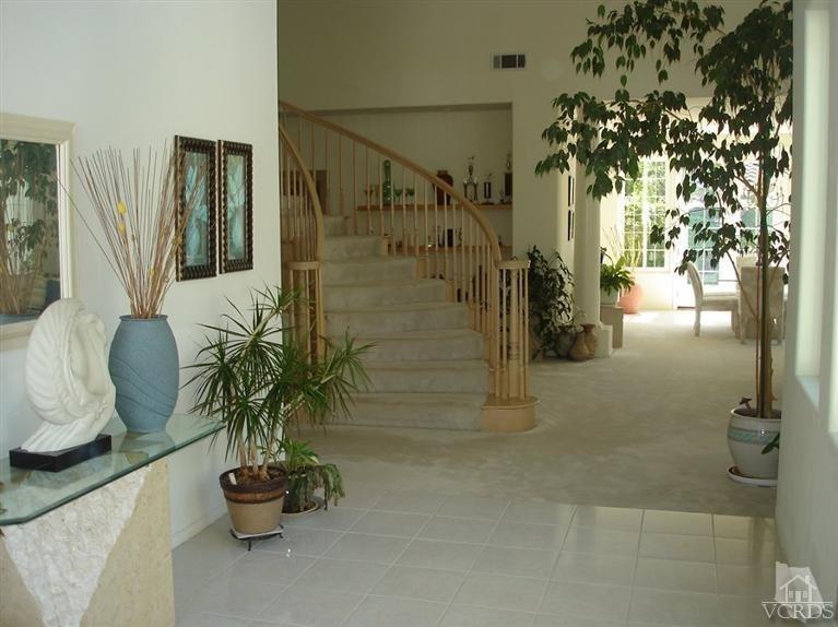 4220 Kingsview Road Moorpark, CA 93021 - Photo 5 of 54 a potted plant sitting in front of a bathroom
