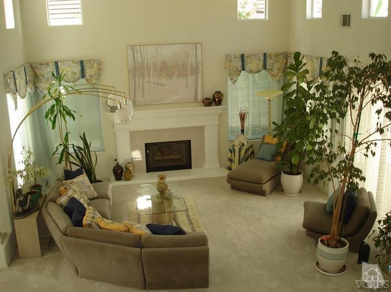 4220 Kingsview Road Moorpark, CA 93021 - Photo 8 of 54 a living room with furniture and a fireplace
