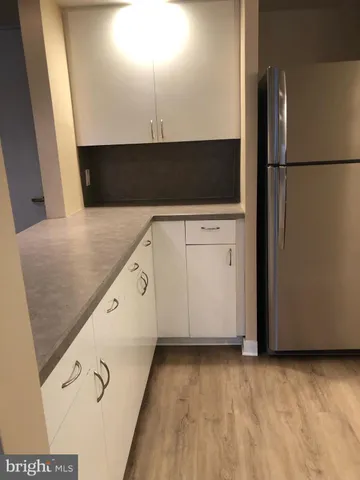 a kitchen with a sink and an oven