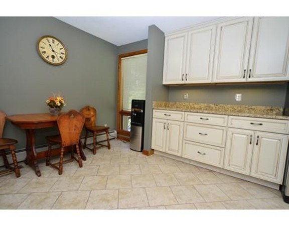556 Burts Pit Road Northampton, MA 01062 - Photo 13 of 24 a view of dining room with furniture and wooden floor