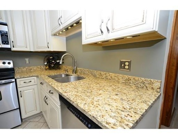 556 Burts Pit Road Northampton, MA 01062 - Photo 14 of 24 a kitchen with a sink and cabinets