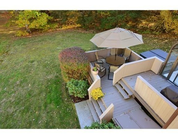 556 Burts Pit Road Northampton, MA 01062 - Photo 5 of 24 a view of a chairs and table on the terrace