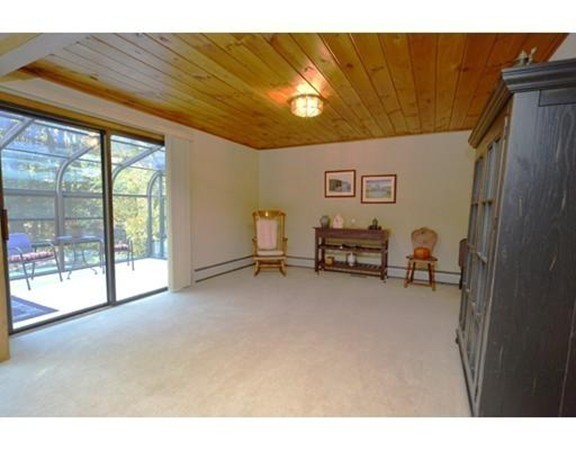 556 Burts Pit Road Northampton, MA 01062 - Photo 6 of 24 a view of living room with furniture and a flat screen tv