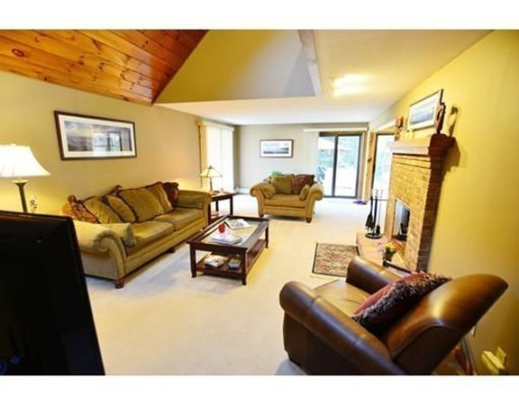 556 Burts Pit Road Northampton, MA 01062 - Photo 10 of 24 a living room with furniture and a large window